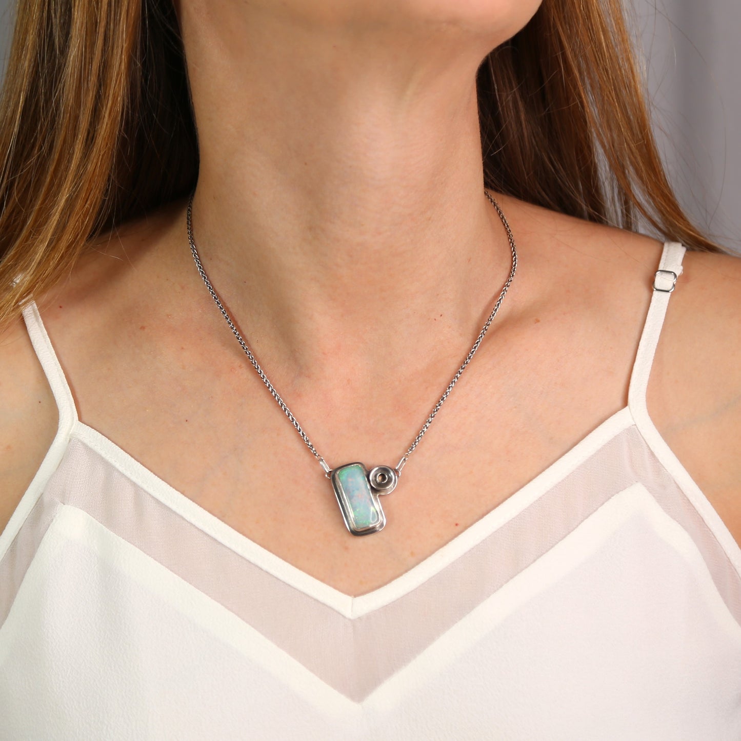 Lab-Created Atlantis Opal Pastel Gemstone set in a Sterling Silver Architectural Geometric Design. Handmade by Cara Carter Jewelry
