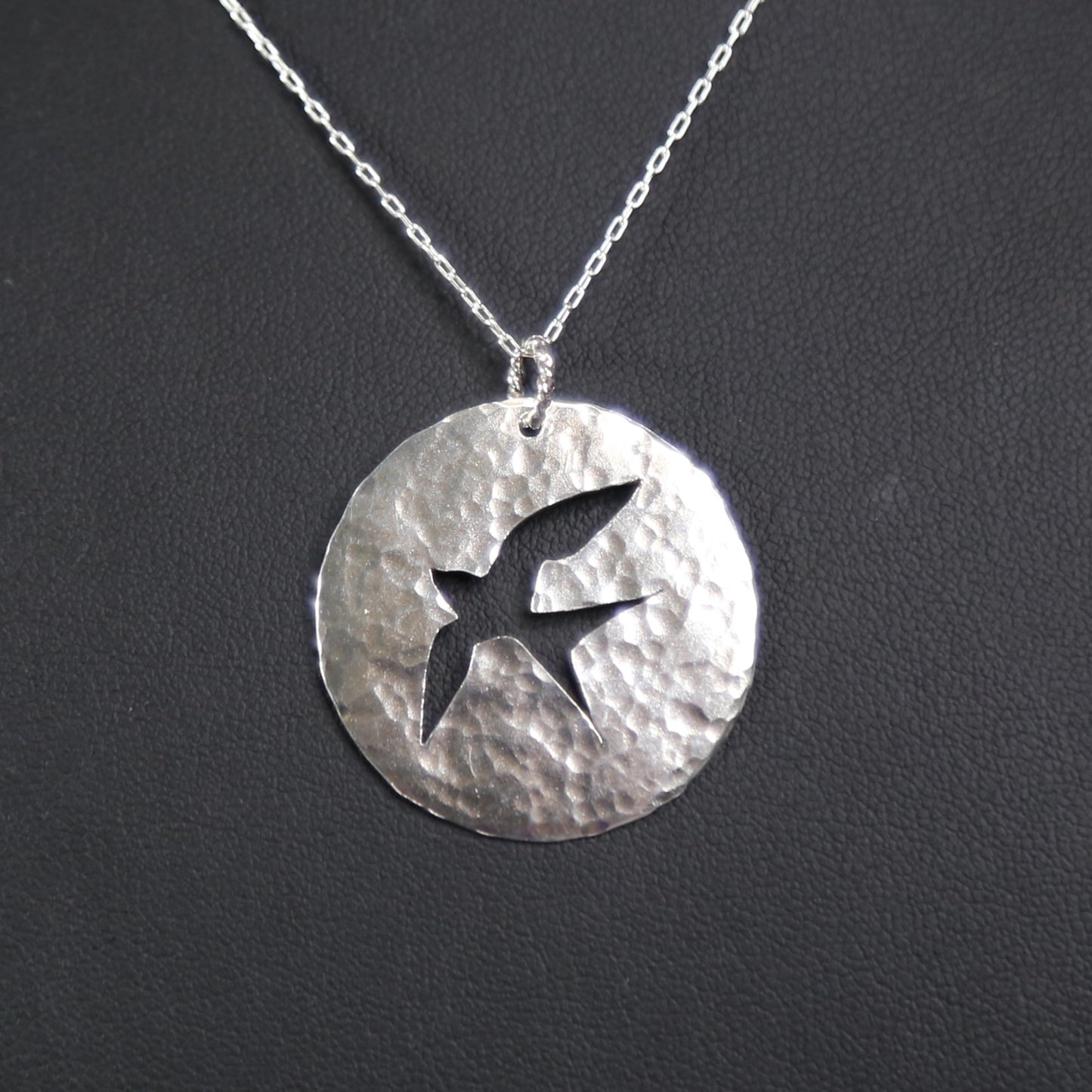 Bird in Flight Silhouette Hand-Pierced and Hammered Sterling Silver Circle Pendant Necklace