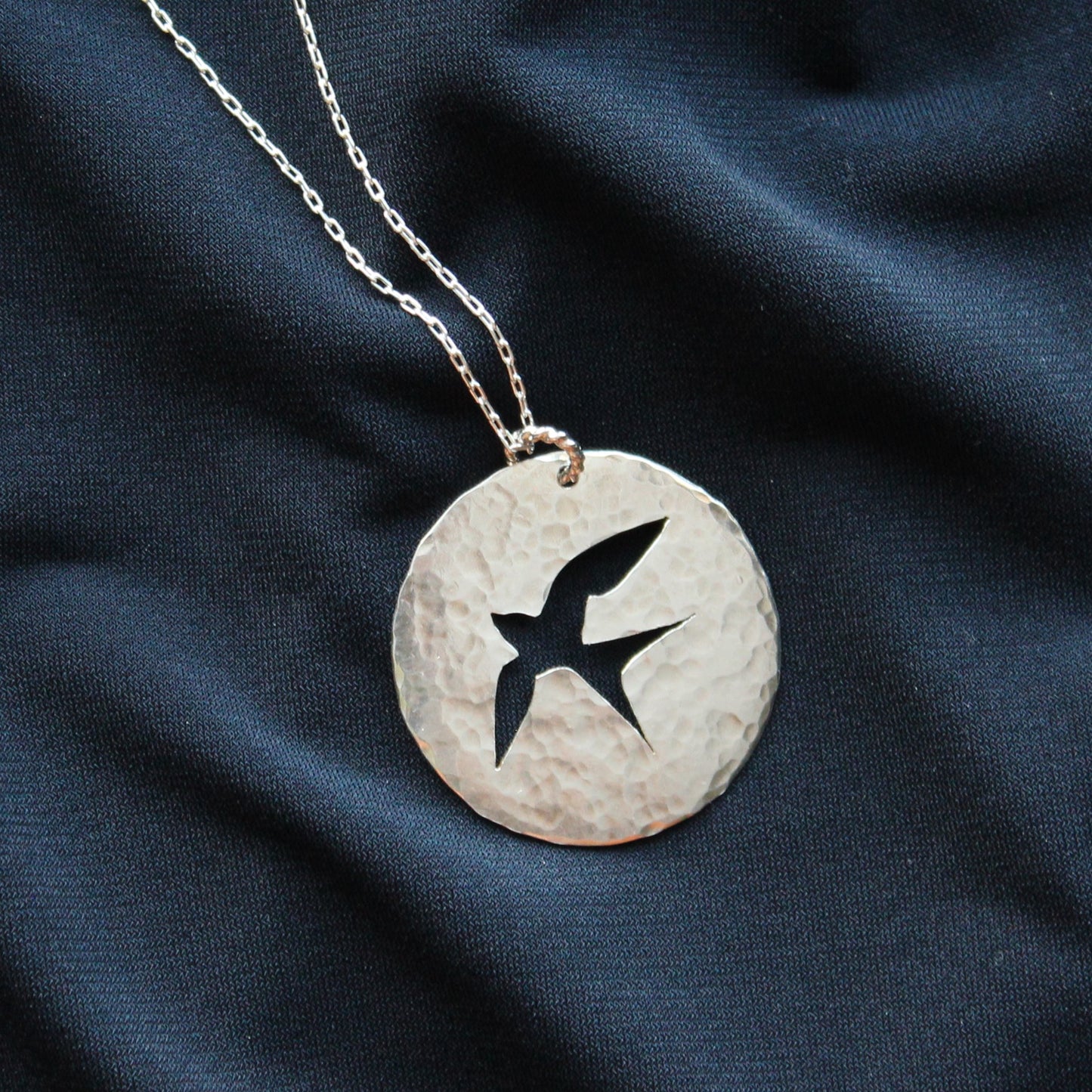 Bird in Flight Silhouette Hand-Pierced and Hammered Sterling Silver Circle Pendant Necklace