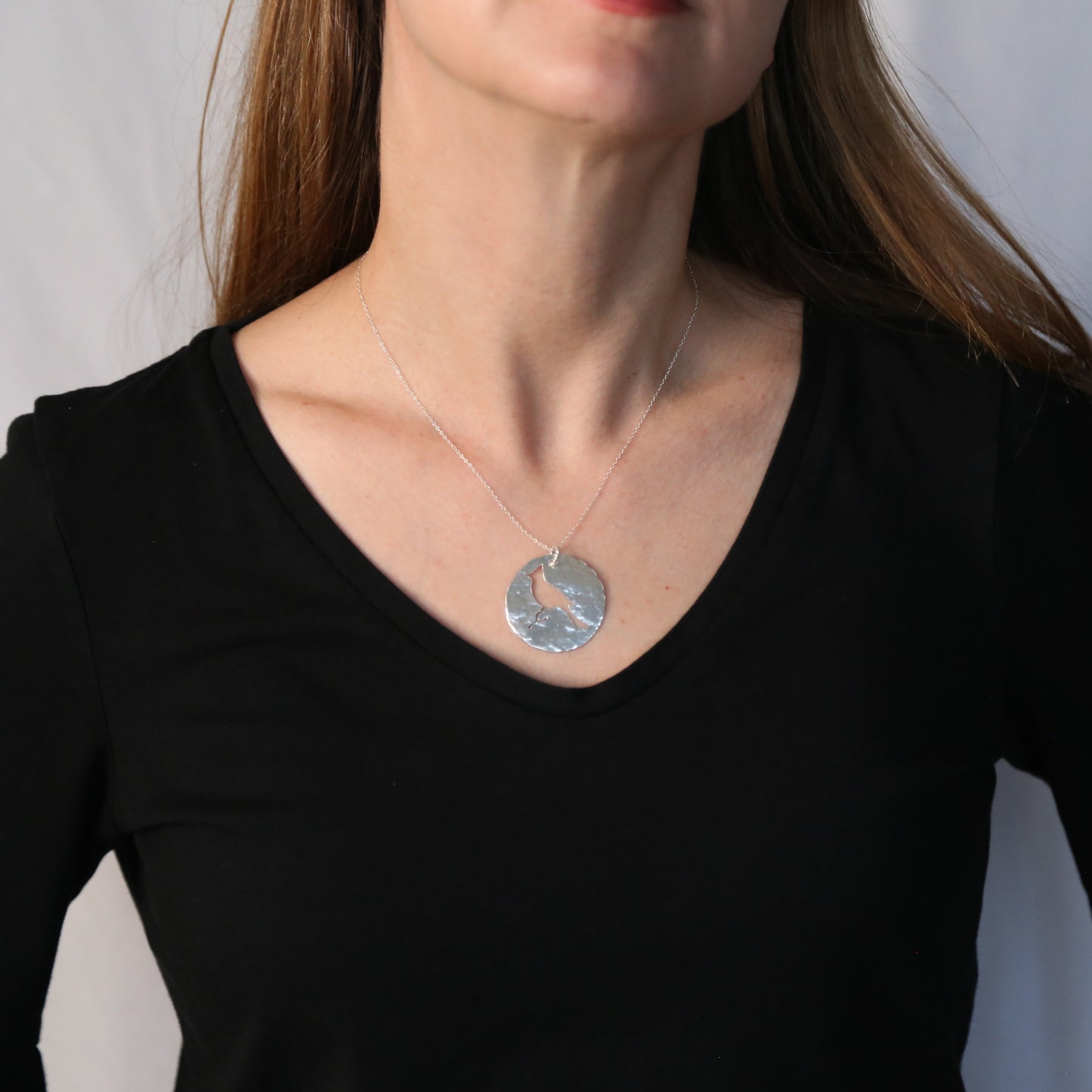 Cardinal Hand-cut and Hammered Circle Sterling Silver Pendant Necklace