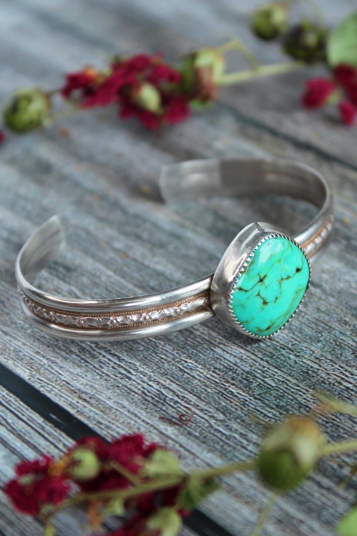 Faustite Green Gemstone set in a patterned oxidized sterling silver cuff. One of kind and handmade by Cara Carter Jewelry