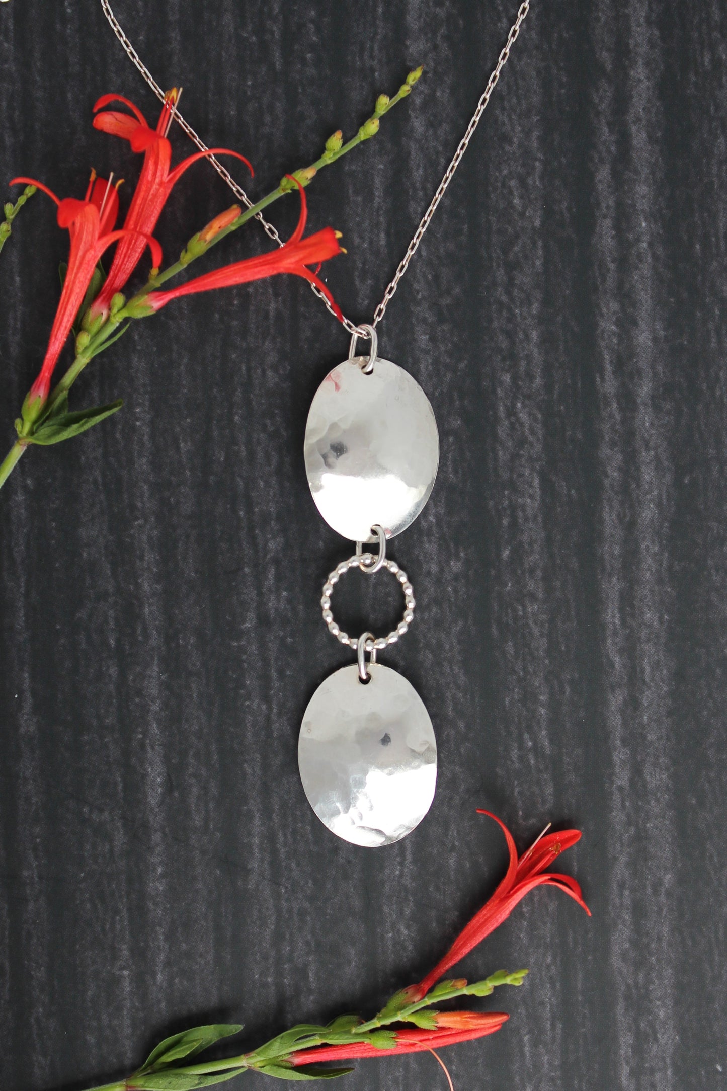 Hammered Oval Shield and Beaded Circle Sterling Silver Pendant Necklace for Everyday Wear. Handmade by Cara Carter Jewelry