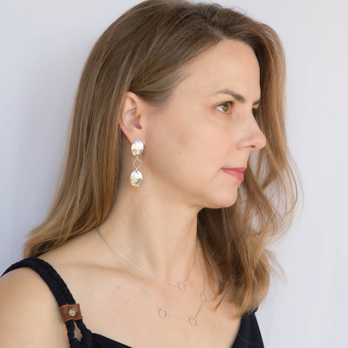 Hammered Shield and Beaded Circle Sterling Silver Dangle Everyday Post Earrings. Handmade by Cara Carter Jewelry
