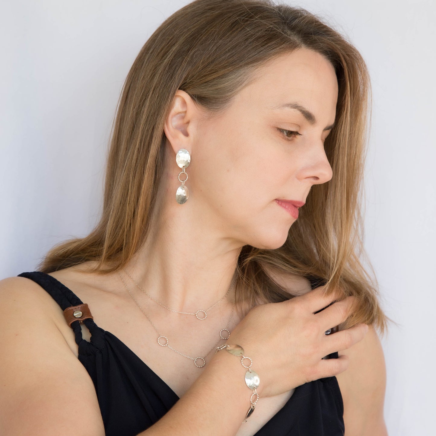 Hammered Shield and Beaded Circle Sterling Silver Dangle Everyday Post Earrings. Handmade by Cara Carter Jewelry