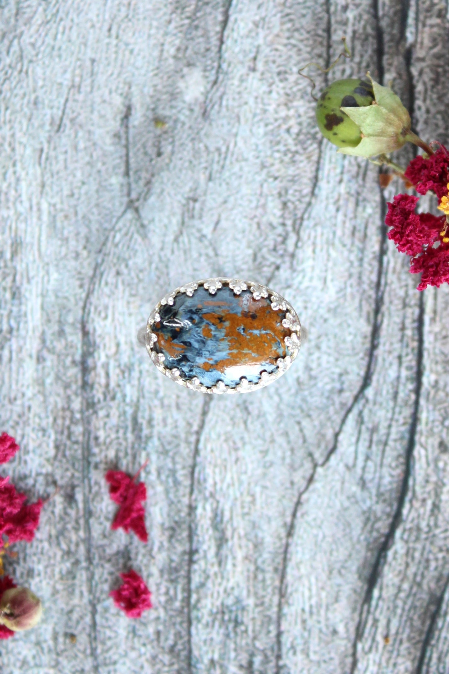 Pietersite Orange and Blue Gemstone Oval Shaped set in Sterling Silver with Smooth Band and Patterned Bezel, size 6.5 Ring. One of Kind and Handmade by Cara Carter Jewelry