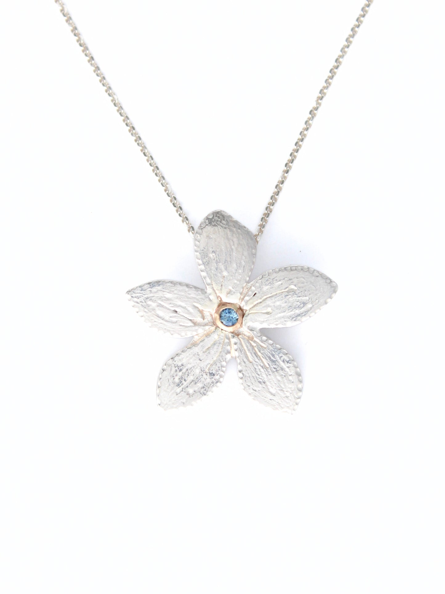 Plumeria Flower Hand-Pierced Sterling Silver and 14K Gold Necklace with Blue Sapphire