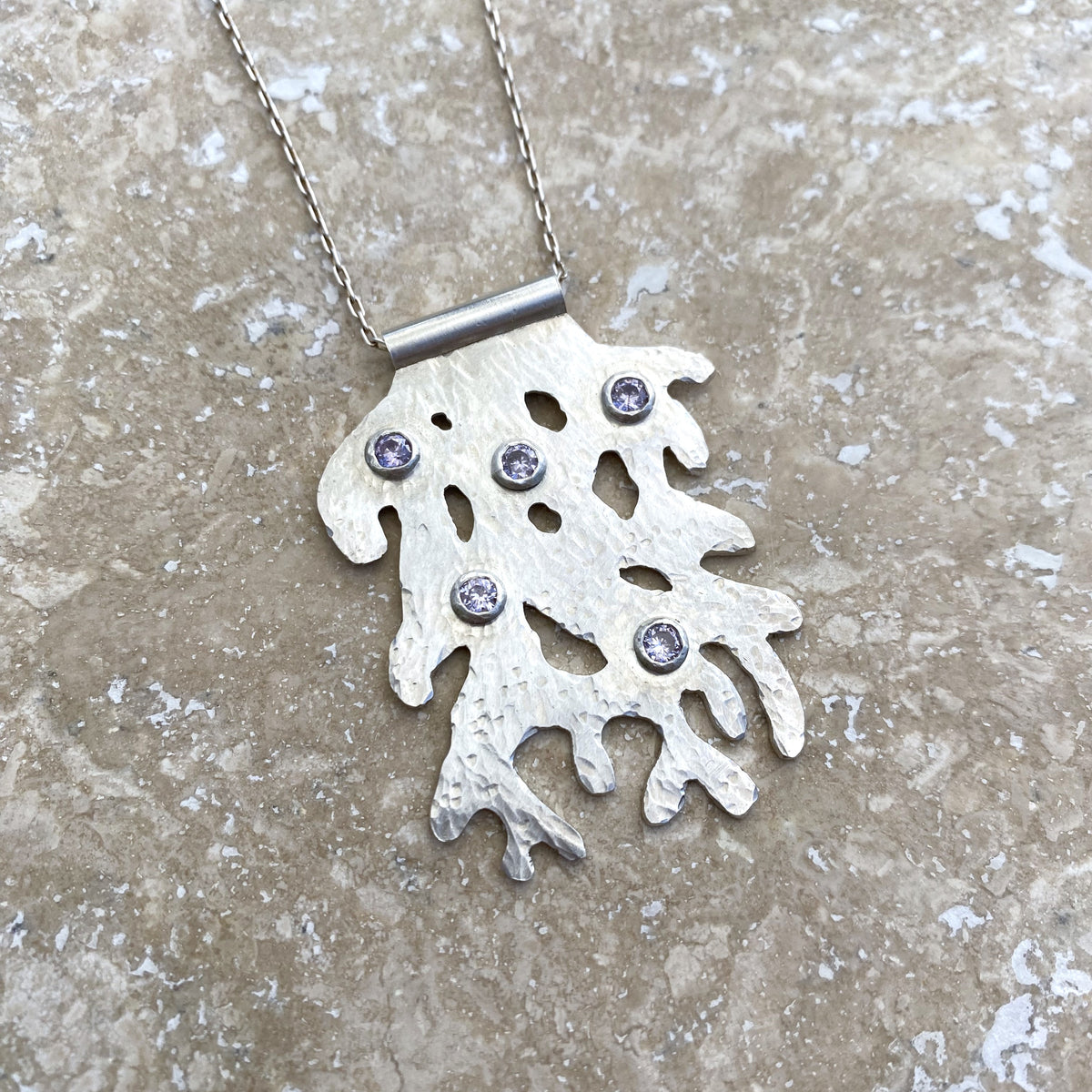 Handmade Coral Drift Hand-Pierced and Hammered Sterling Silver Pendant Necklace with Cubic Zirconia Gemstones by Cara Carter Jewelry