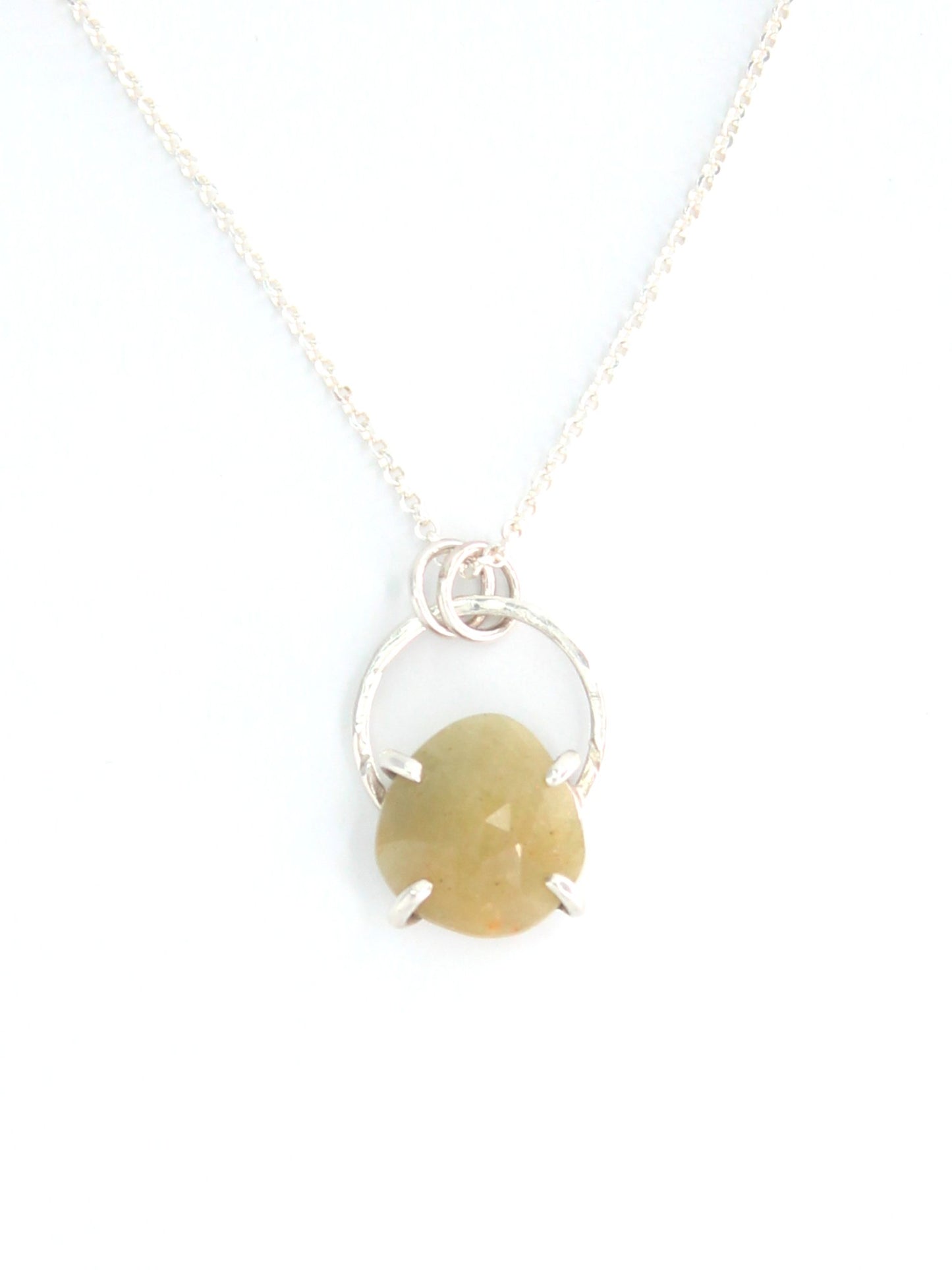Handmade faceted yellow sapphire sterling silver pendant necklace in prong and halo setting.