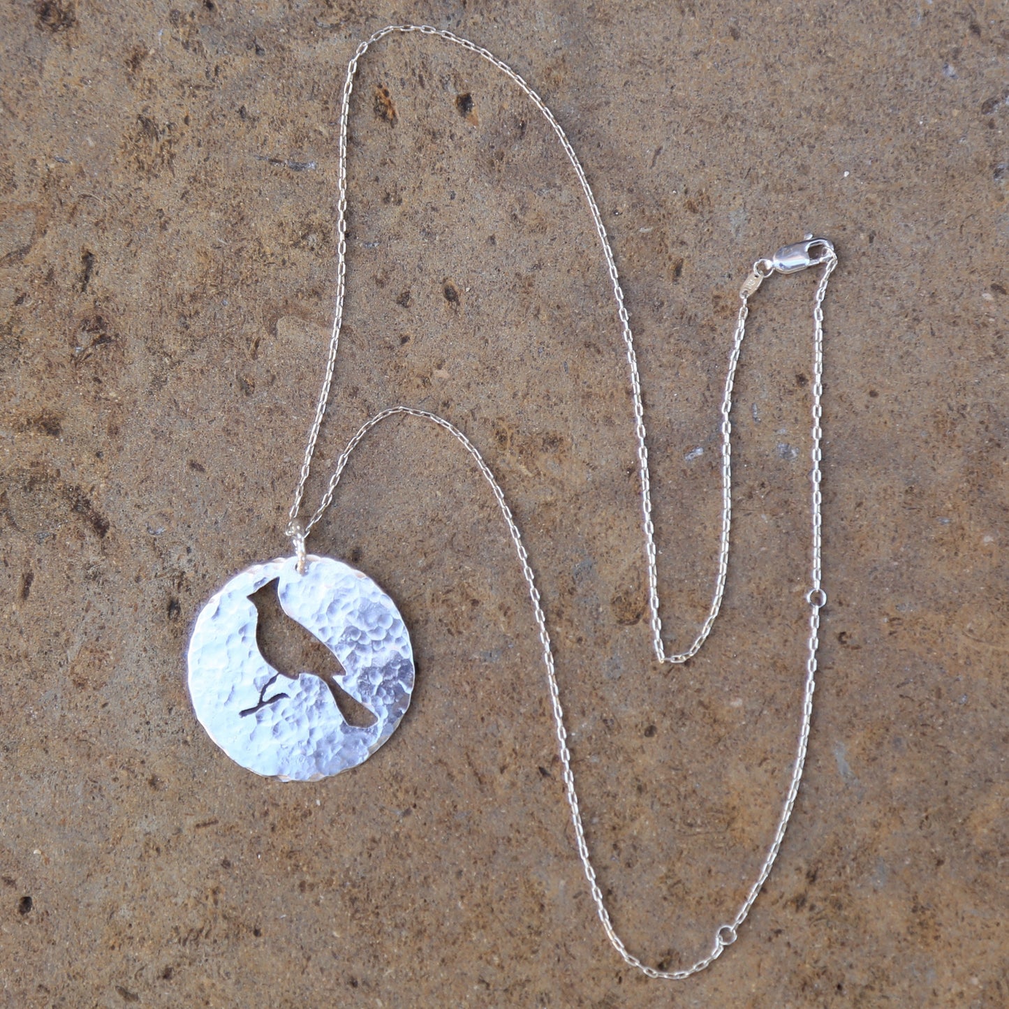 Cardinal Hand-cut and Hammered Circle Sterling Silver Pendant Necklace