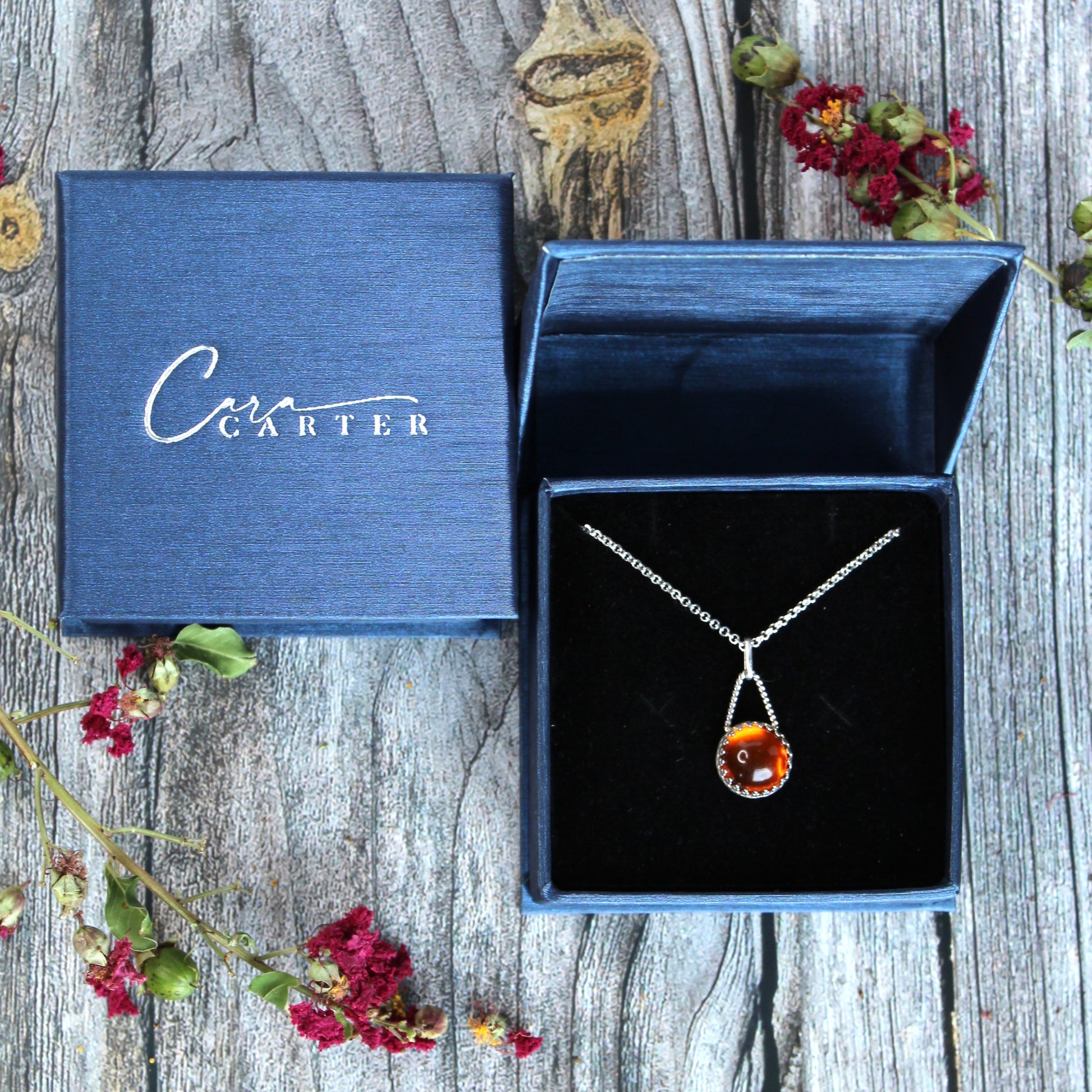 Amber Clear Orange Gemstone Sterling Silver Pendant Necklace set in Patterned Bezel. Handmade by Cara Carter Jewelry