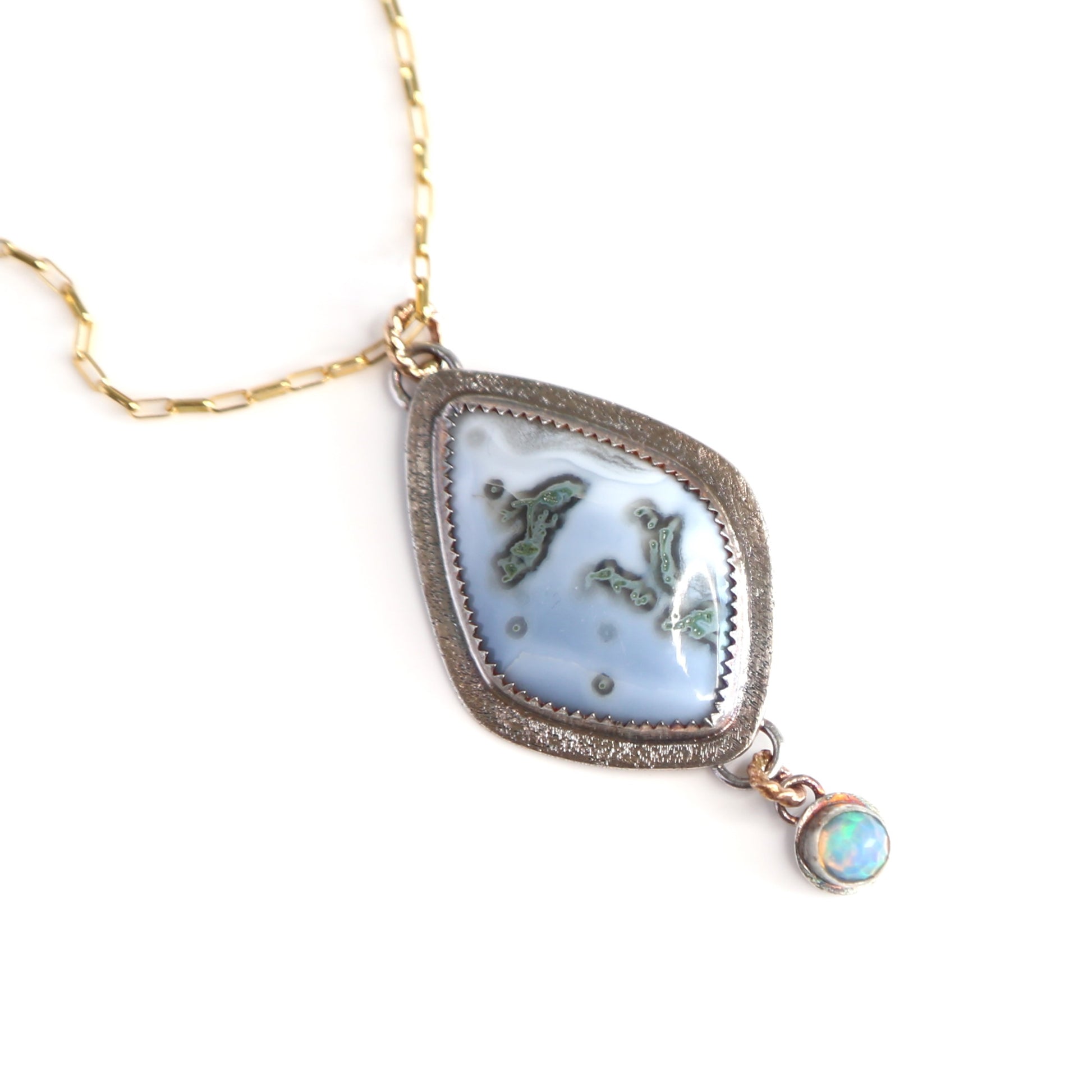 Australian Blue Opal and Faceted White Opal set in Sterling Silver and 14k gold-filled with 14k gold-filled necklace. One of a Kind and Handmade by Cara Carter Jewelry