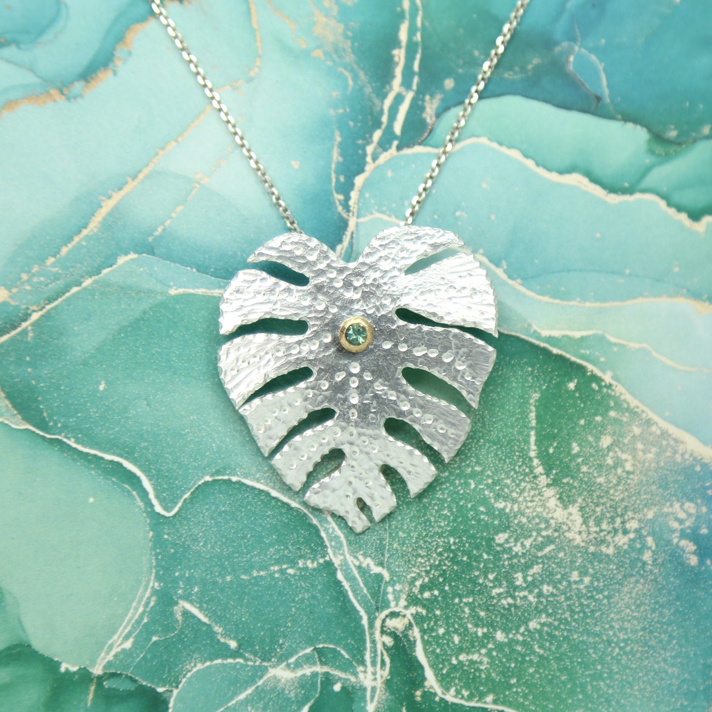 Monstera Hand-Pierced Sterling Silver and 14K Gold Necklace with Green Sapphire