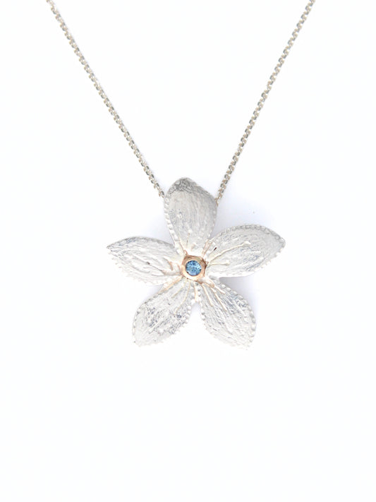 Plumeria Flower Hand-Pierced Sterling Silver and 14K Gold Necklace with Blue Sapphire