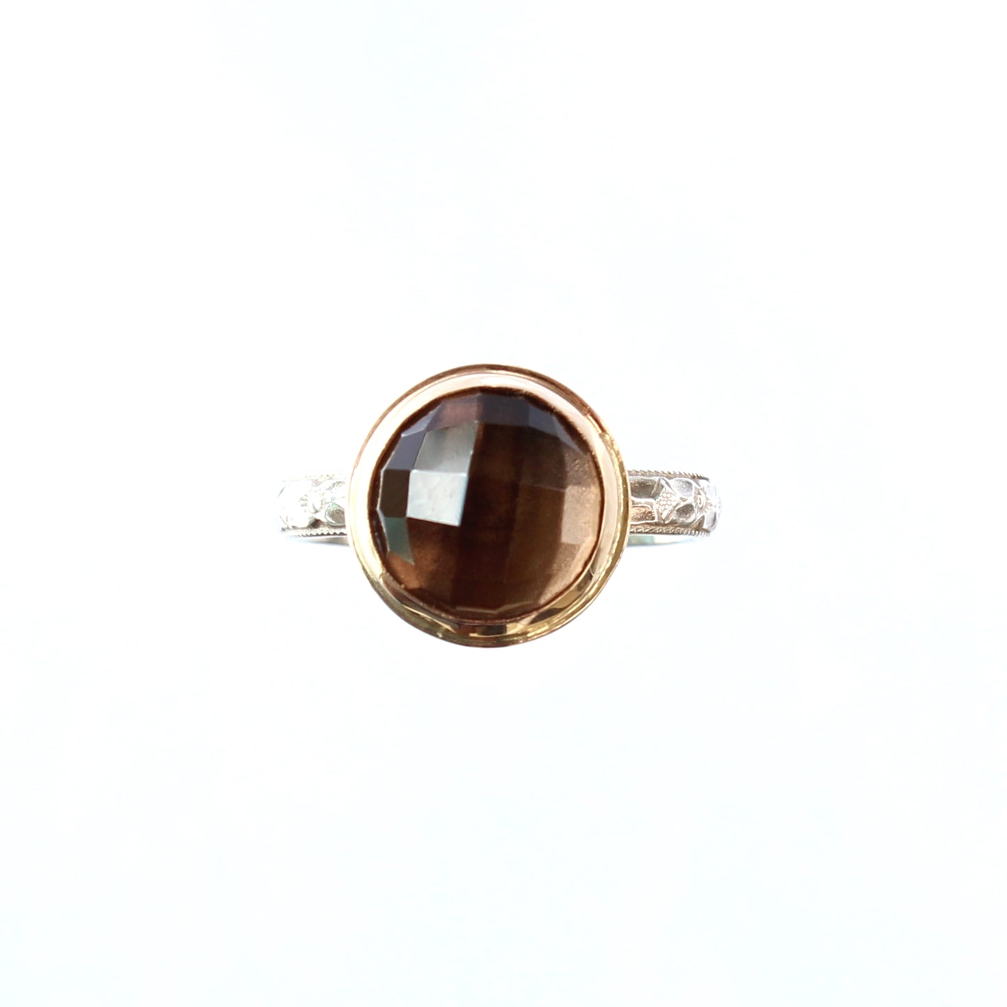 Smoky Quartz Brown Faceted Gemstone set in 14k Gold Bezel with a Patterned Sterling Silver Band
