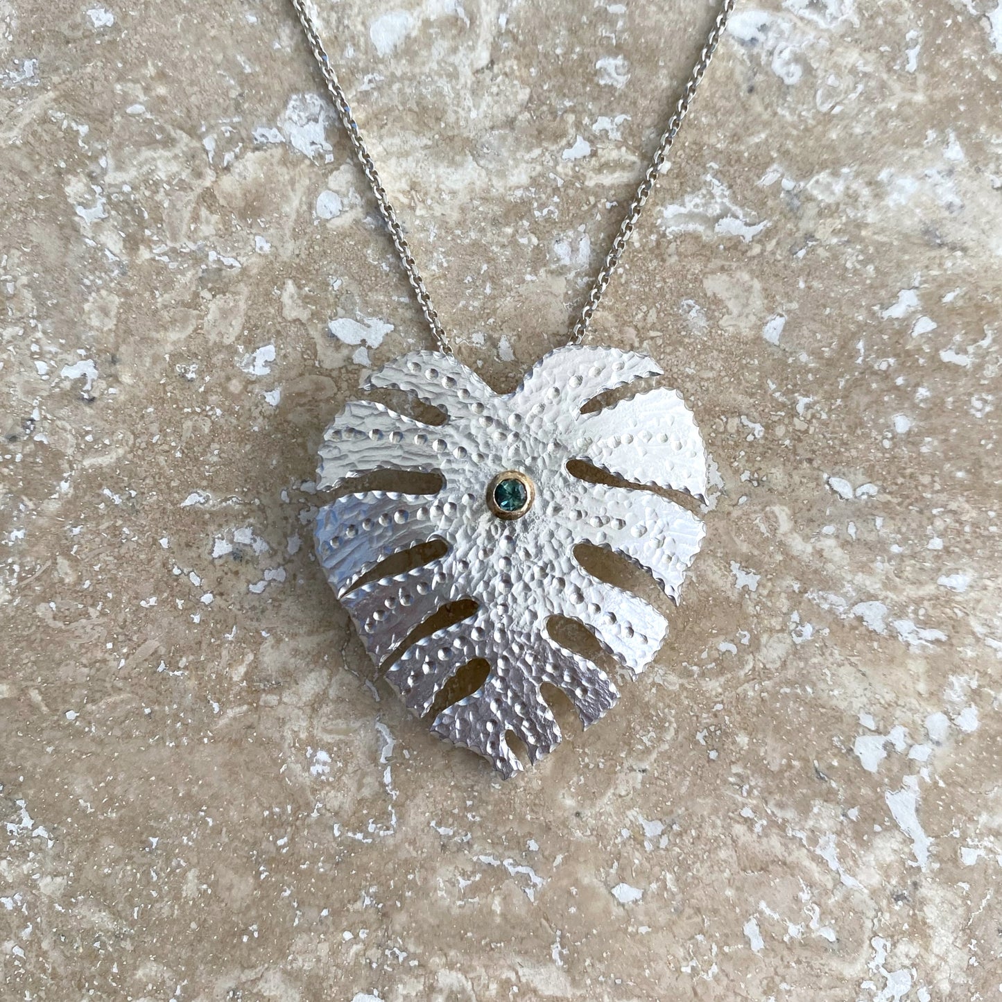 Monstera Hand-Pierced Sterling Silver and 14K Gold Necklace with Green Sapphire