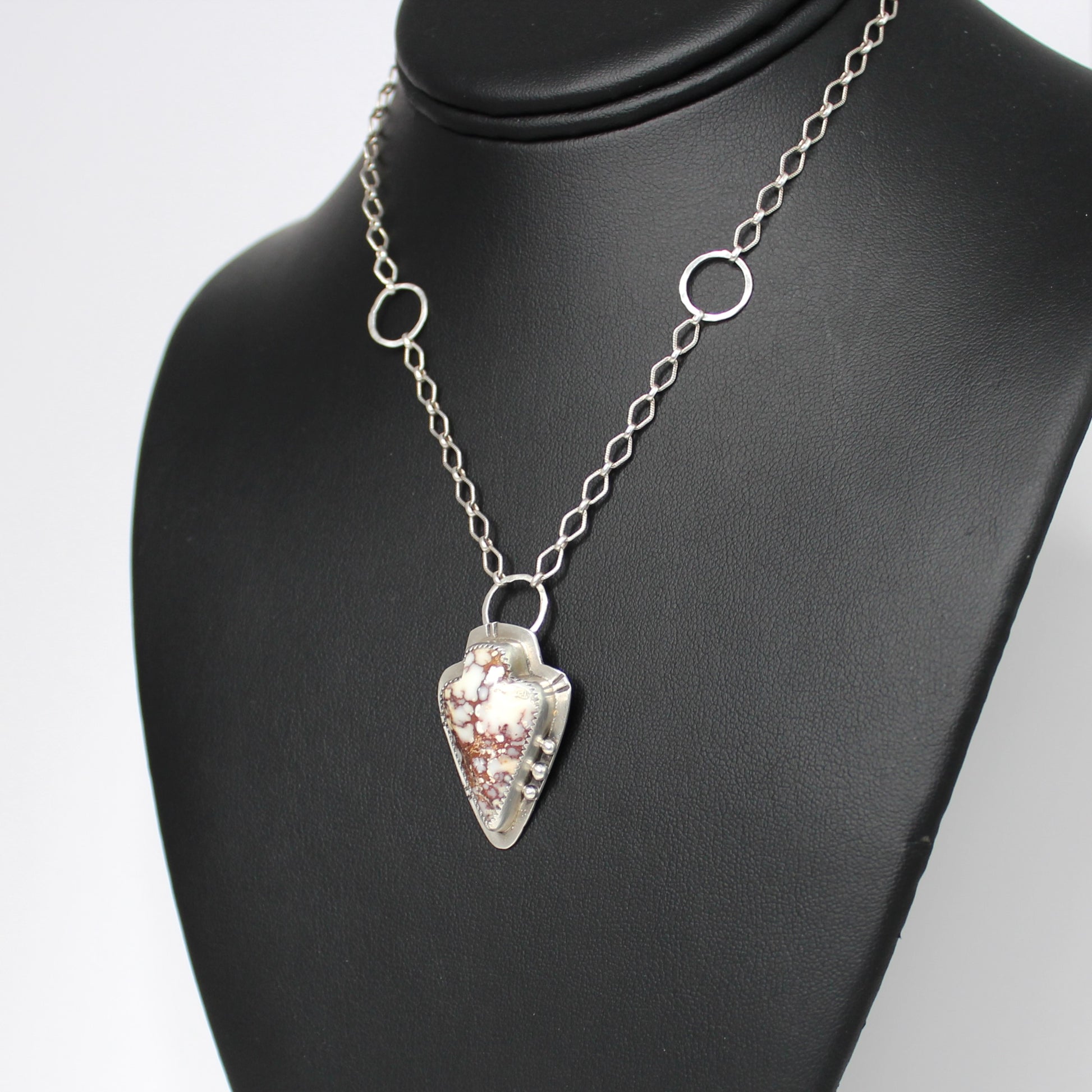 Wildhorse Magnesite Arrowhead Shaped Brown White Gemstone set in Sterling Silver with Silver Beads and Hammered Circle Accents