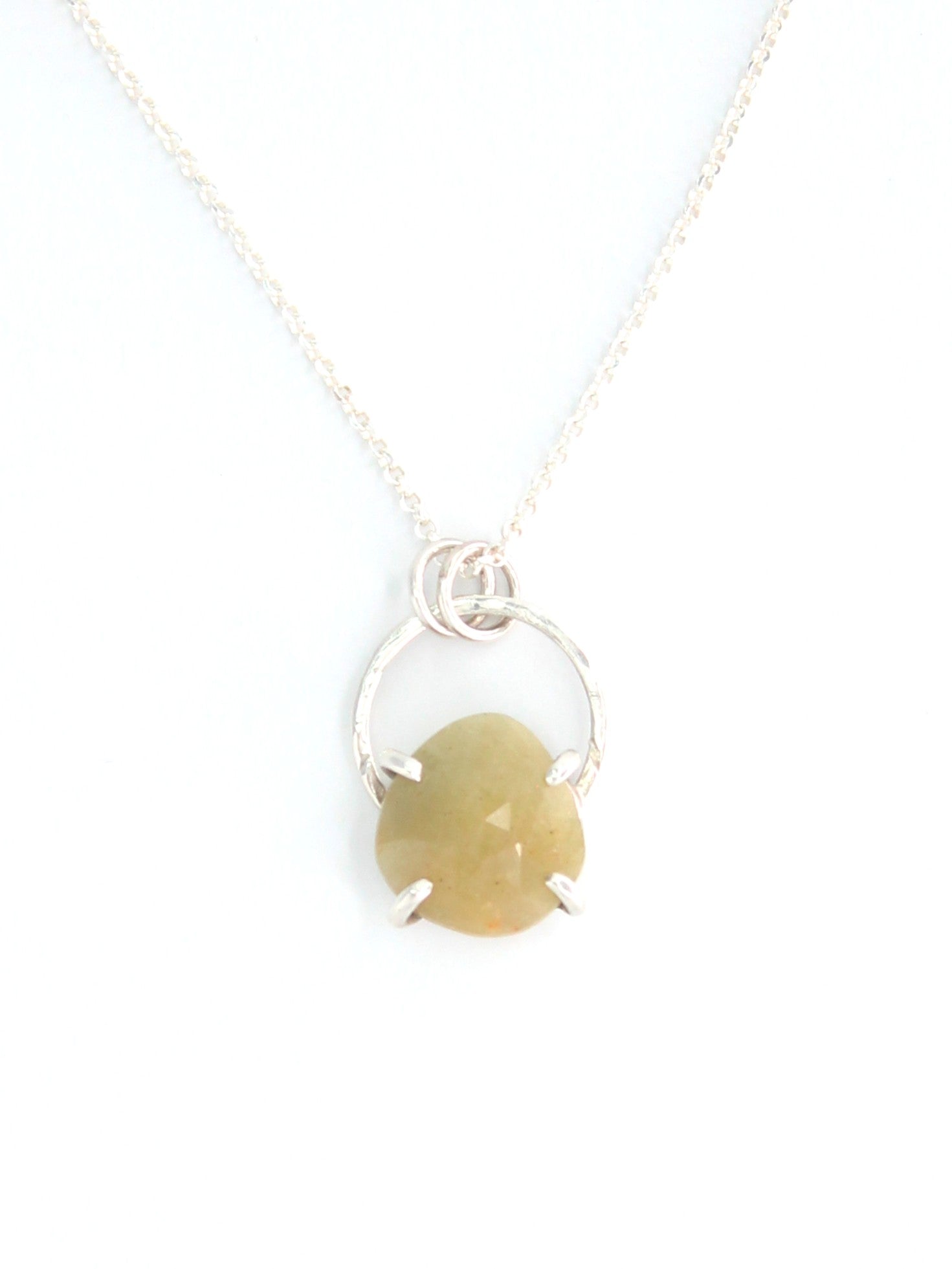 Handmade faceted yellow sapphire sterling silver pendant necklace in prong and halo setting.